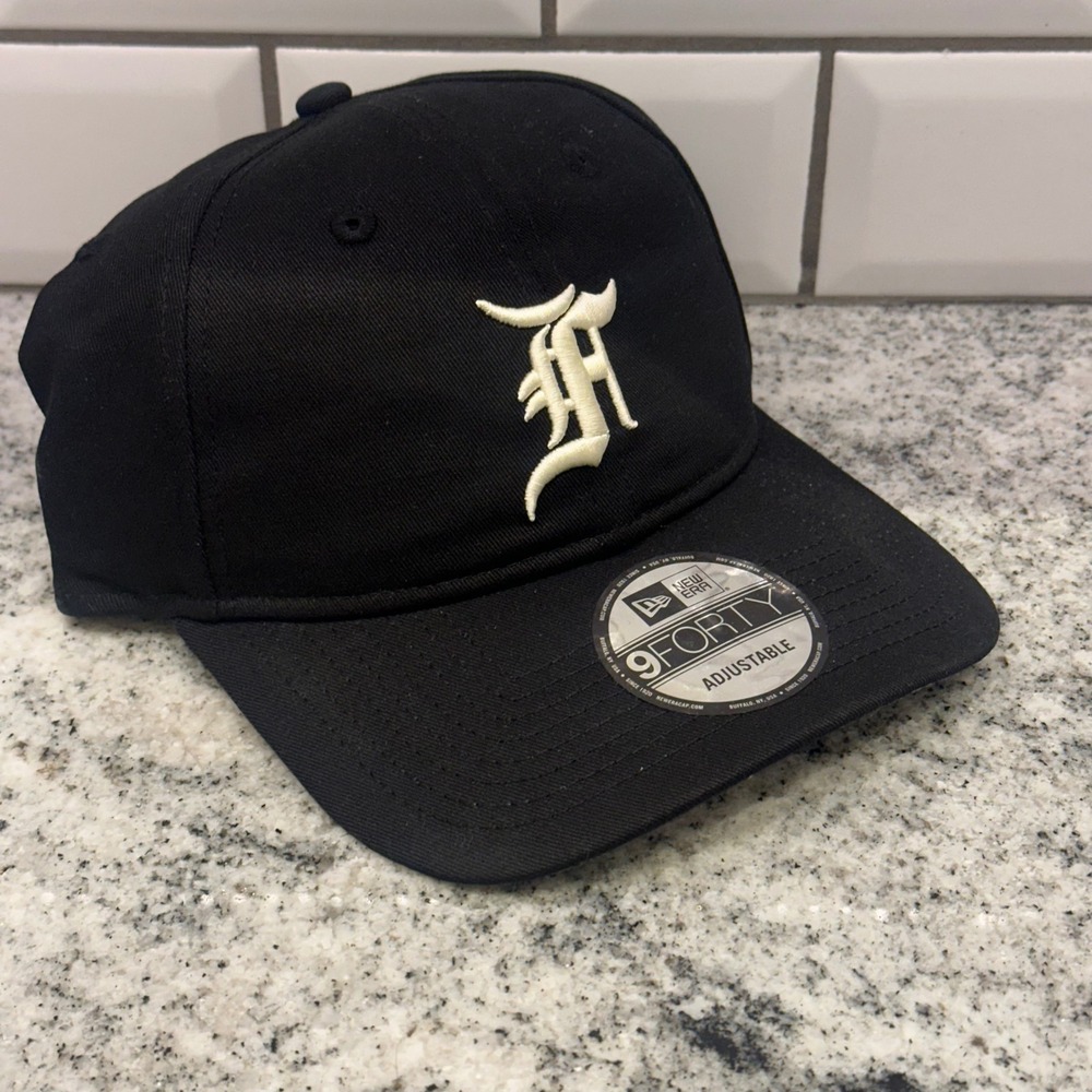 Fear of God New Era Mens OS 9FORTY Hat Black Essentials Gothic F Strapback Cap